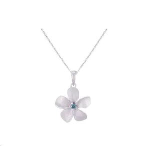 14k 15mm Plumeria Pendant with Blue Diamond